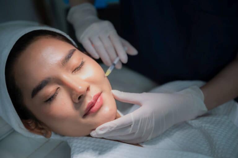young asian woman getting botox treatment